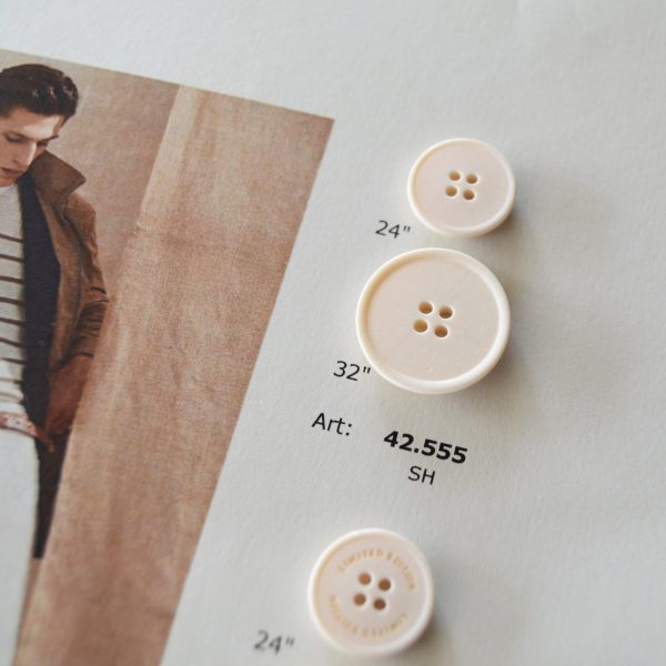 Botón de resina de hueso